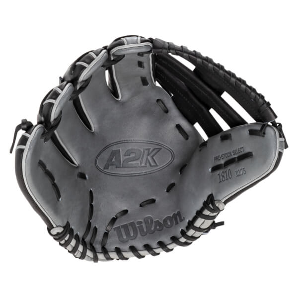 Top-down view of a gray Wilson A2K baseball glove with black lacing and "1810 12.75" embossed on the palm.