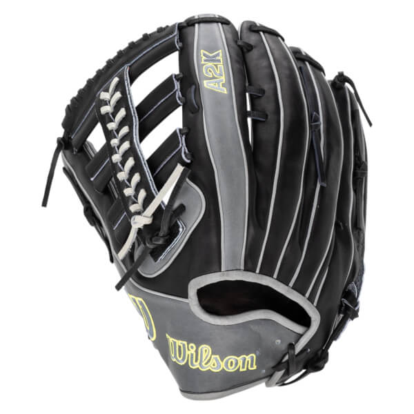Side view of a black Wilson A2K baseball glove with grey accents and yellow stitching.