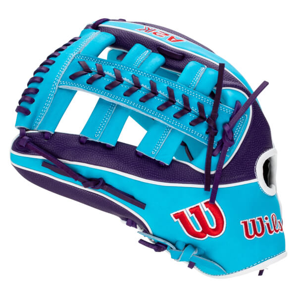 Side view of a cyan and purple baseball glove featuring a red "W" logo, white piping, and "Wilson" and "A2K" text.