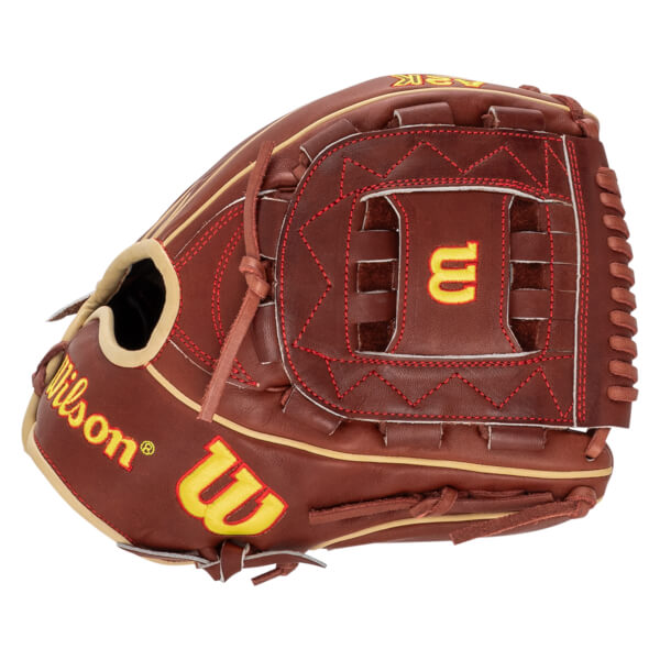 Side view of a brown baseball glove with yellow "Wilson" logo and red stitching.