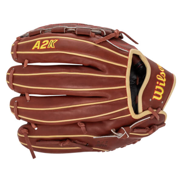 Top-down view of a brown baseball glove with yellow "A2K" and "Wilson" lettering and "AJZ JAPAN" text.