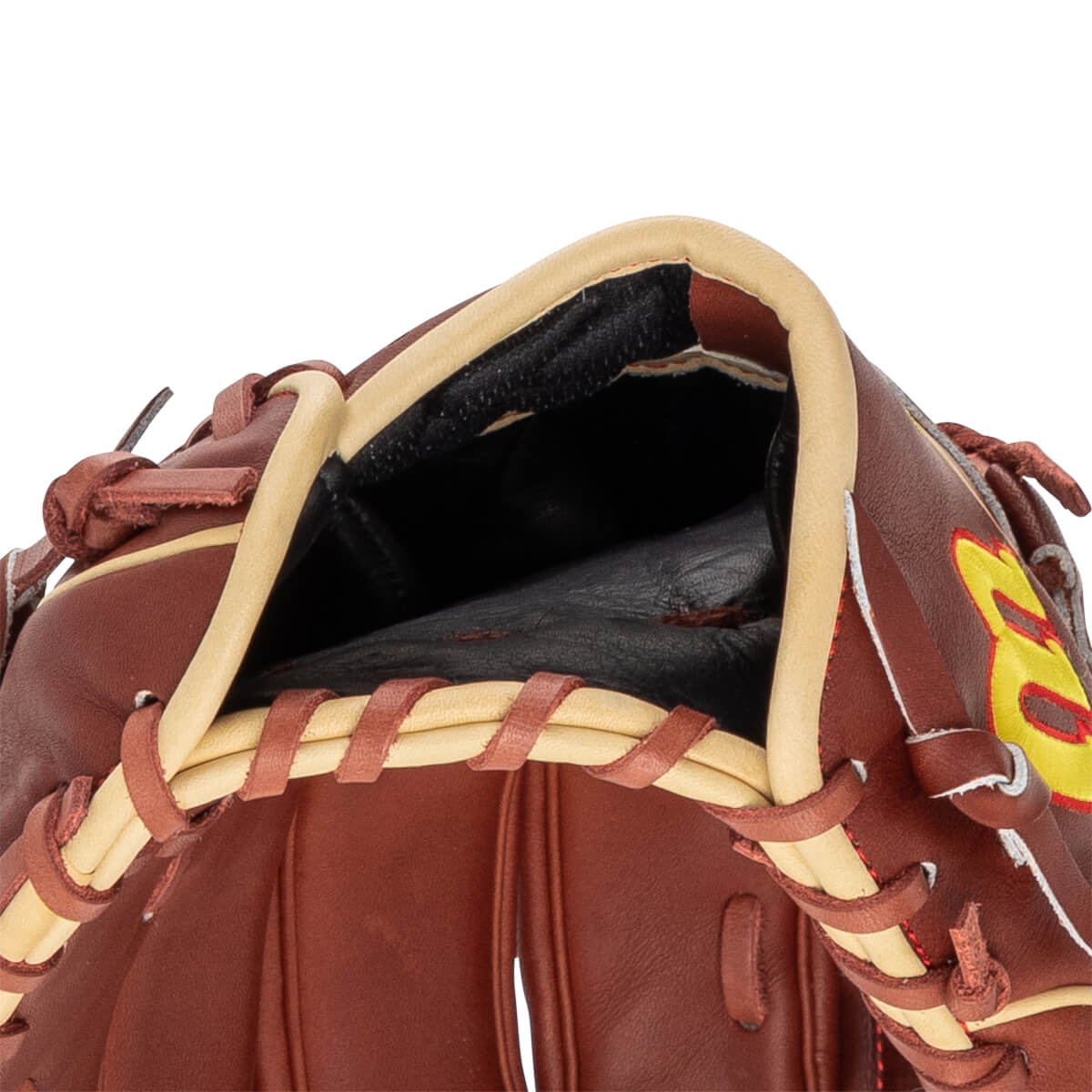 Close-up of the opening of a brown baseball glove with tan lacing and a yellow and red logo.