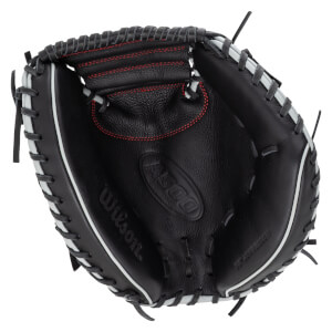 Top-down view of a black baseball glove with white lacing and red stitching, showing the "Wilson" logo and "A500" detail.