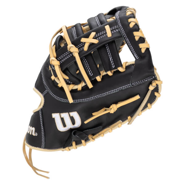 Front view of a black Wilson baseball glove with tan lacing and white stitching, featuring a white "W" logo.