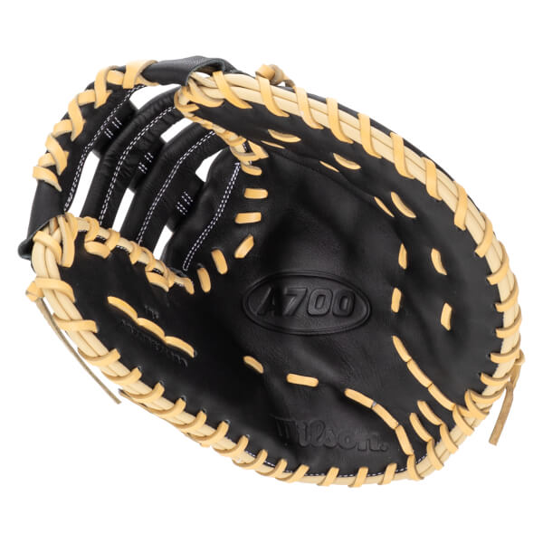 Top-down view of a black baseball glove with tan lacing and "A700" and "Wilson" branding.