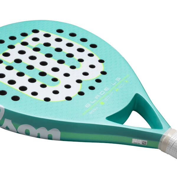 Close-up of a teal padel racket showing the "W" logo, black holes, and "BLADE LS" text.
