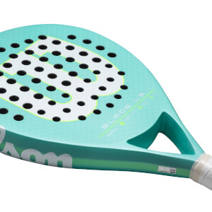 Close-up of a teal padel racket showing the "W" logo, black holes, and "BLADE LS" text.