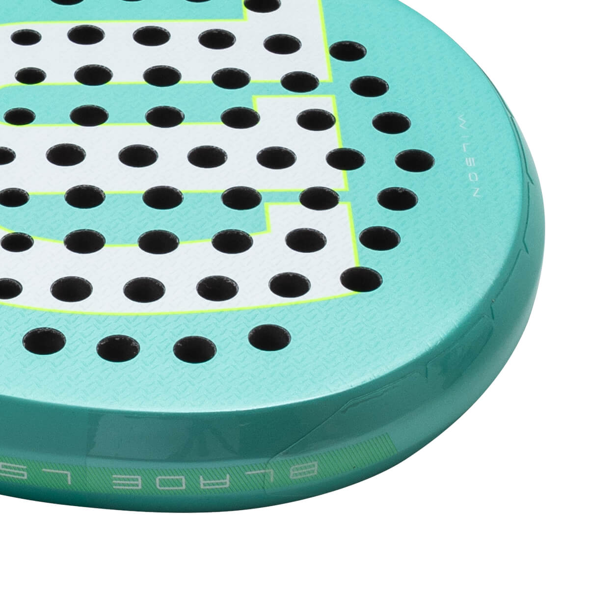 Corner view of a teal padel racket with white dots, yellow trim, and "WILSON" text.