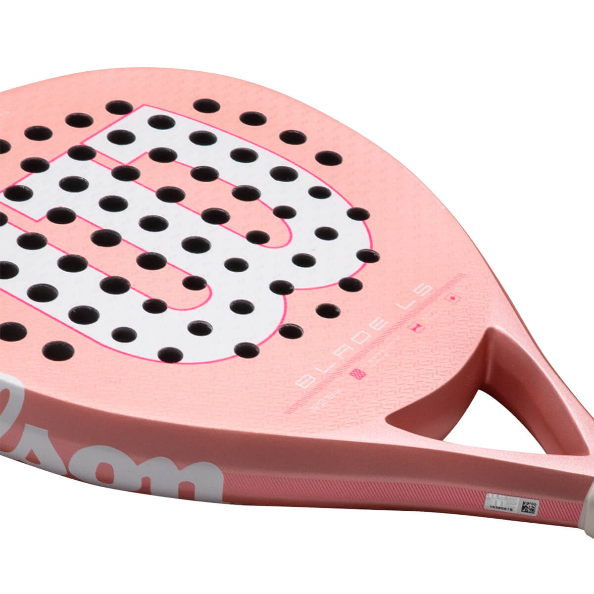 Corner view of a pink Wilson Blade LS padel racket with black dots and white lettering.
