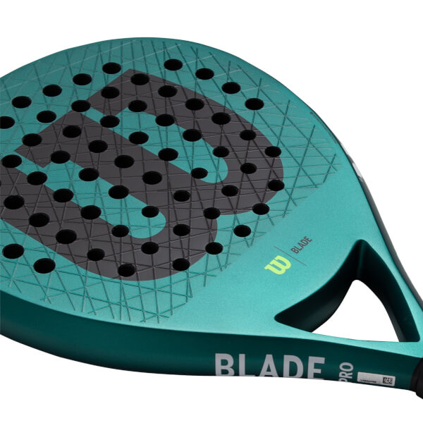 Close-up of a teal padel racket with a textured surface, large dark gray W logo, and BLADE PRO on the frame.