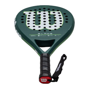 Front view of a green Wilson Blade padel racket with a large white "W" logo and black grip.