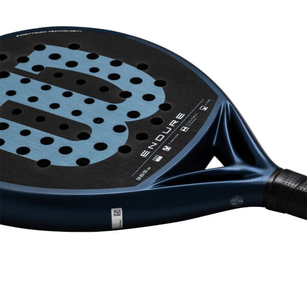 Close-up of a dark blue padel racket showing the "ENDURE" text, a large Wilson logo, and "EXACTTOUCH TECHNOLOGY".