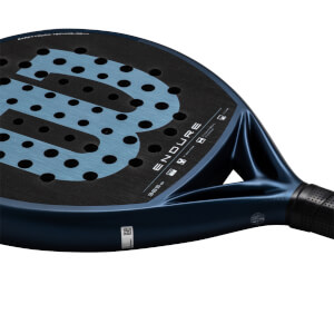 Close-up of a dark blue padel racket showing the "ENDURE" text, a large Wilson logo, and "EXACTTOUCH TECHNOLOGY".