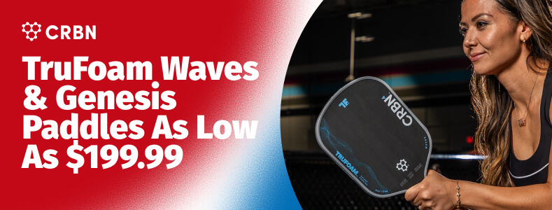 CRBN TruFoam Waves & Genesis Paddles As Low As $199.99. A woman holds a CRBN paddle.